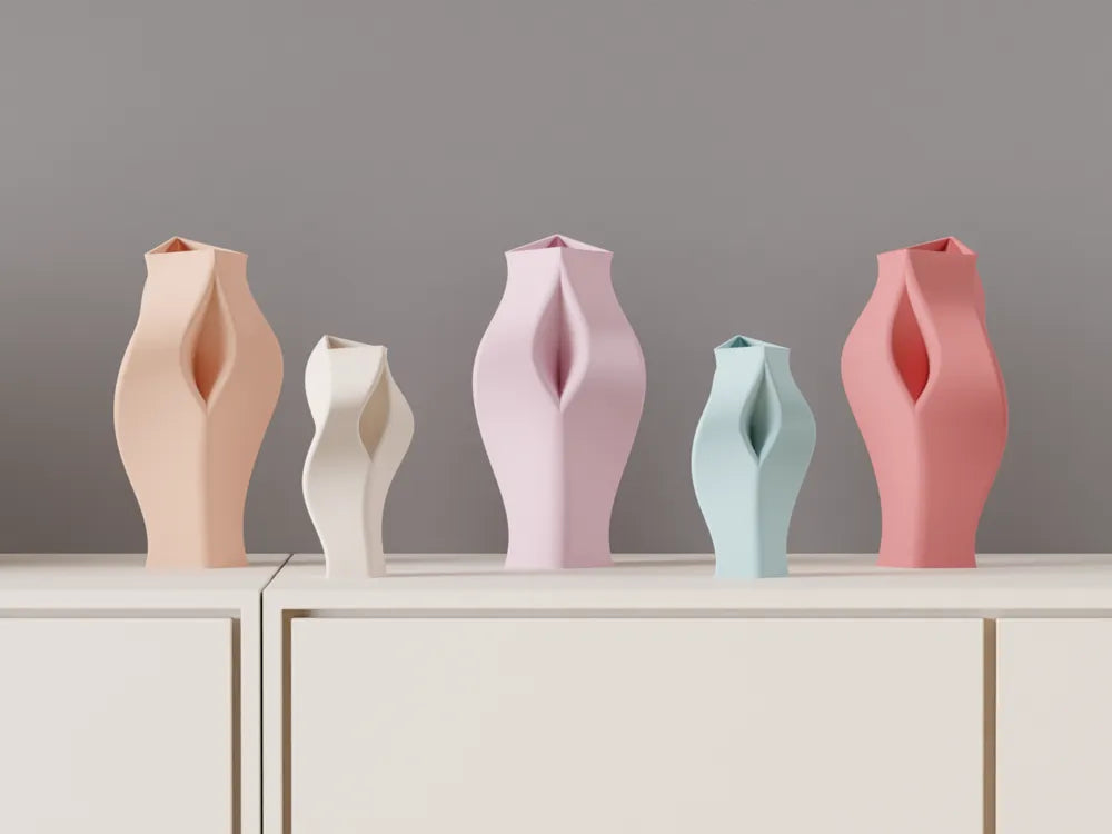 Blue sculptural vase with a twisted silhouette and angular cuts