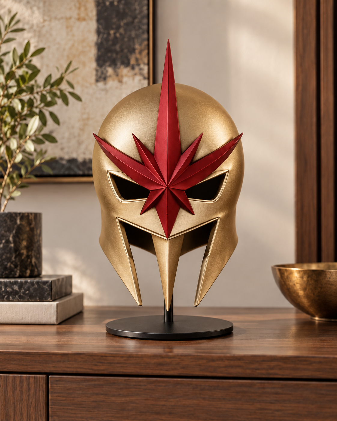 Champagne gold Nova Corps-inspired helmet with red star emblem on display.