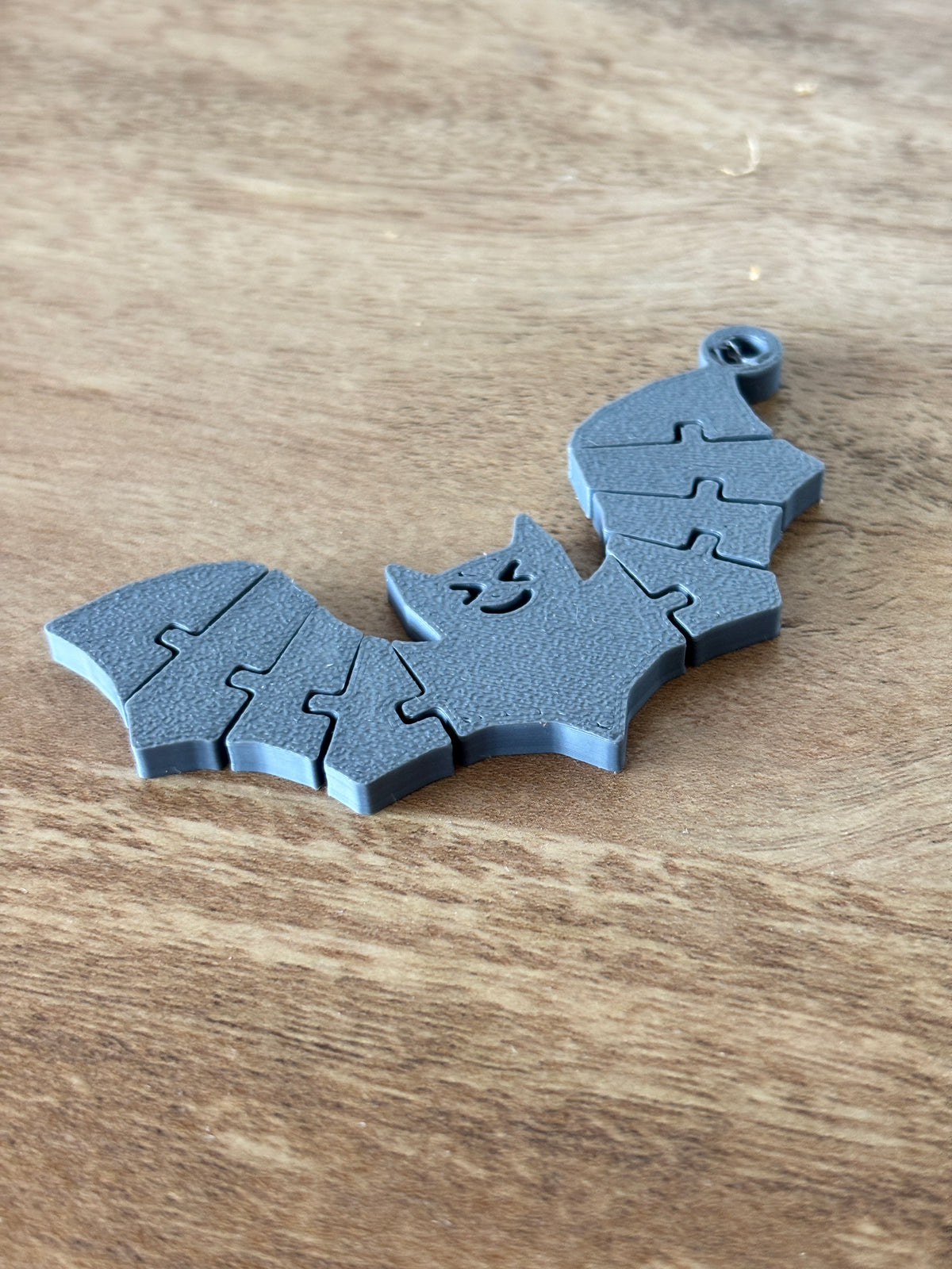 Ghost, pumpkin and bat Halloween flexi keychains together