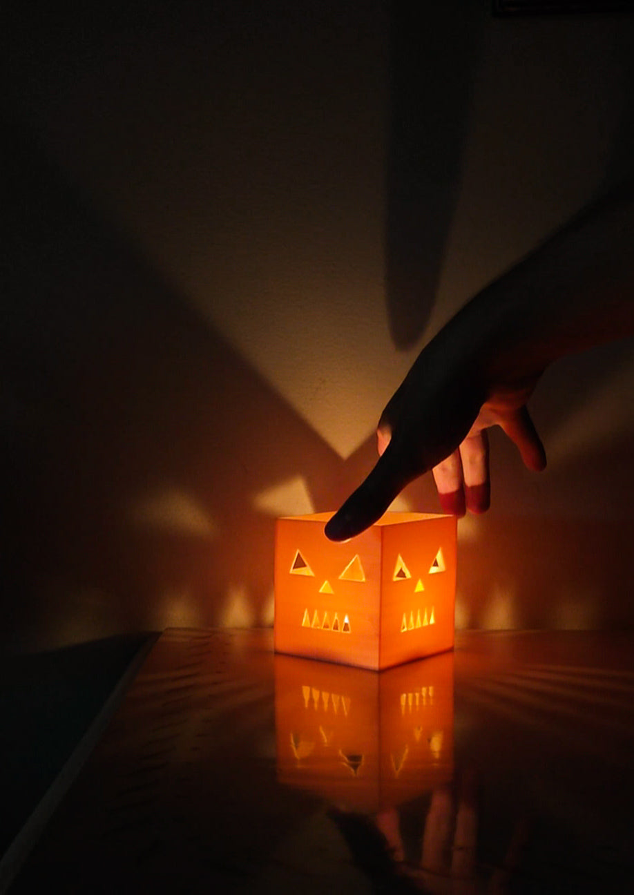 Orange cube pumpkin candle holder, product photo