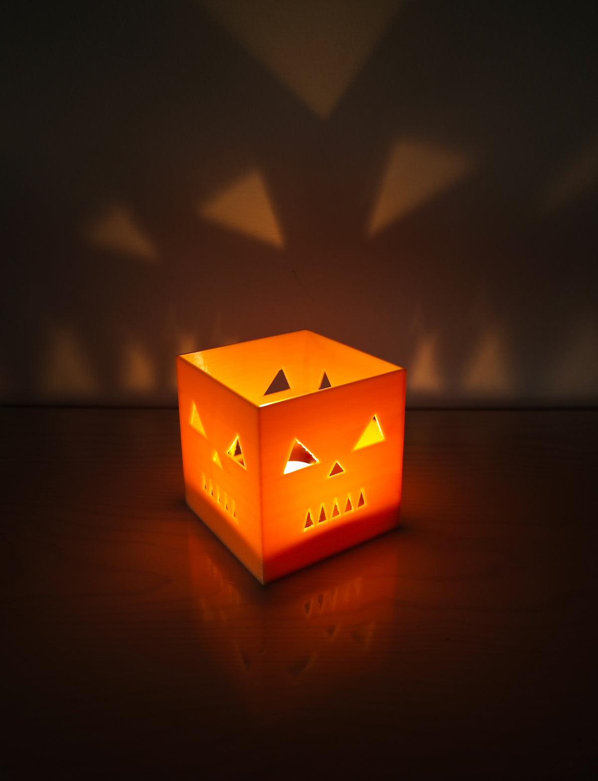 Orange cube pumpkin candle holder, product photo