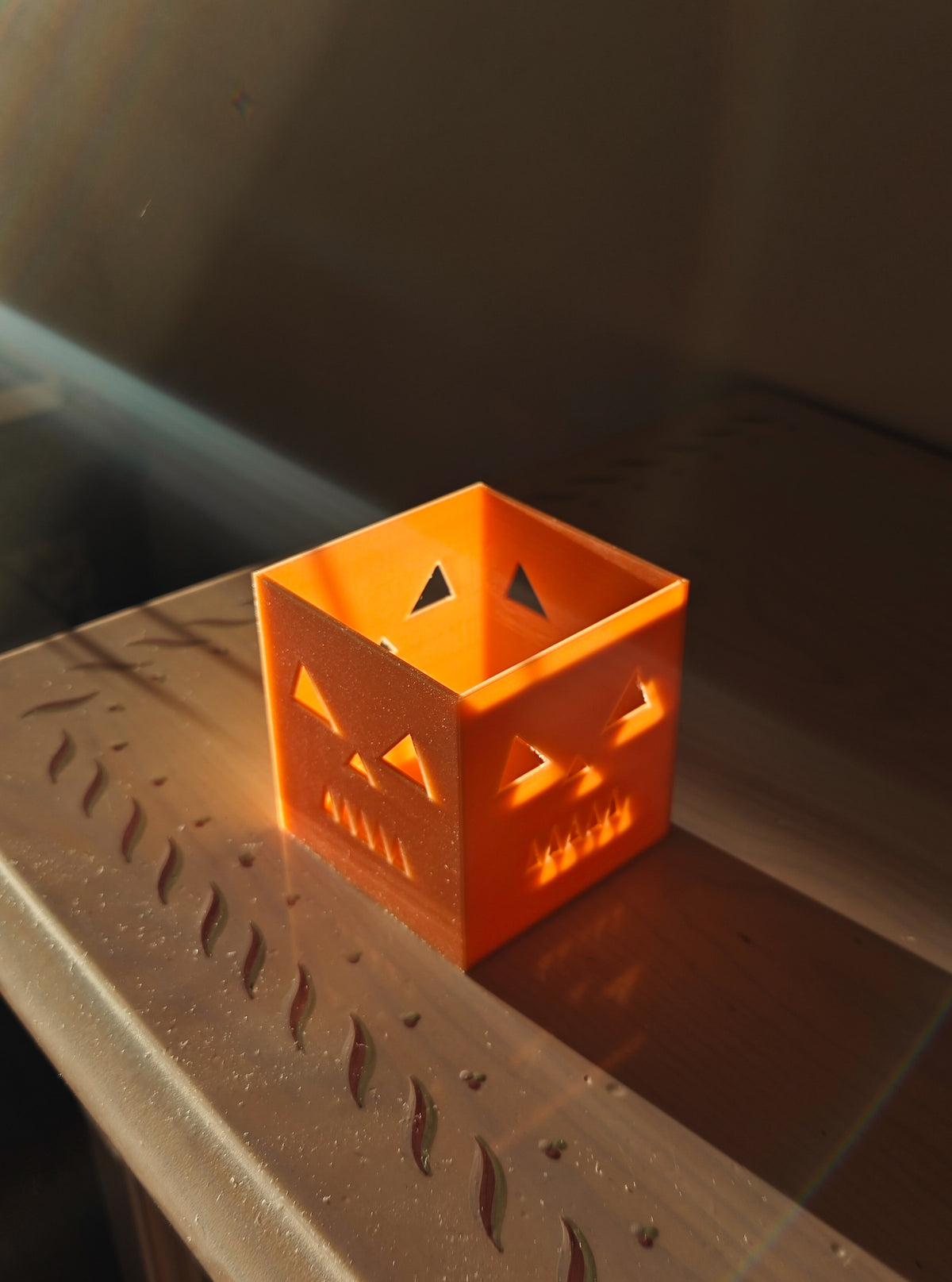 Orange cube pumpkin candle holder, product photo