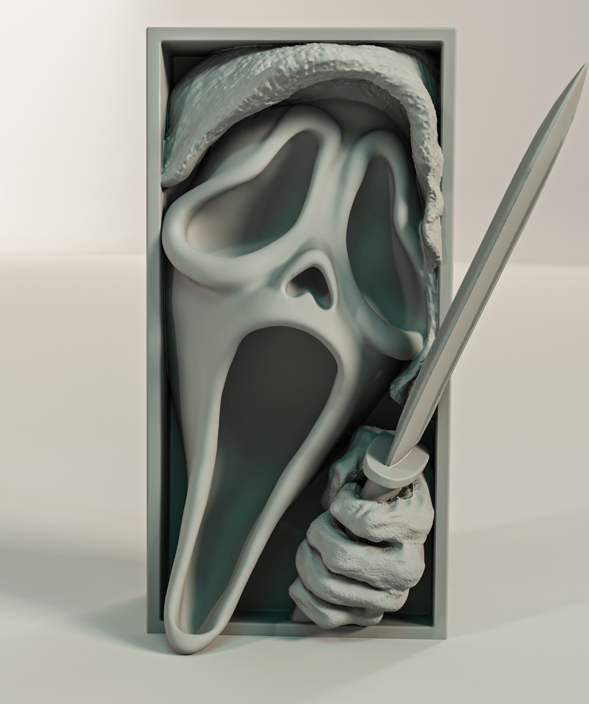 Scream book nook relief sculpture grey rectangular framed box Ghostface mask flowing hooded robe screaming hollow mouth clawed hand clutching knife blade knife blade extending beyond frame right side three quarter front view neutral background showing full sculptural depth