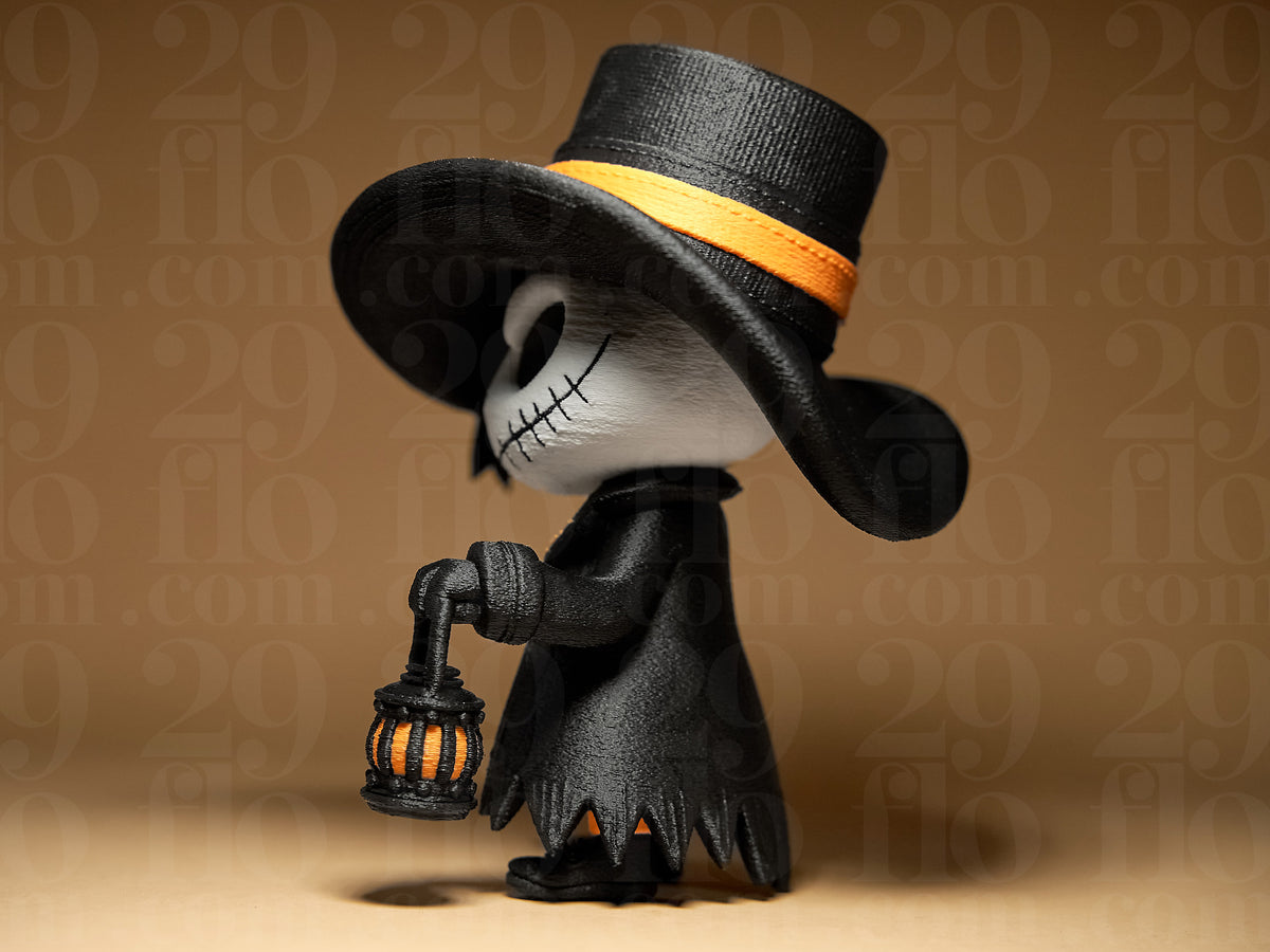 Jack Skellington Halloween Minifigure Sculpture — front full body variant showing complete chibi minifigure silhouette, wide hat brim, outstretched lantern arms and orange boot ankle accents on warm shelf background