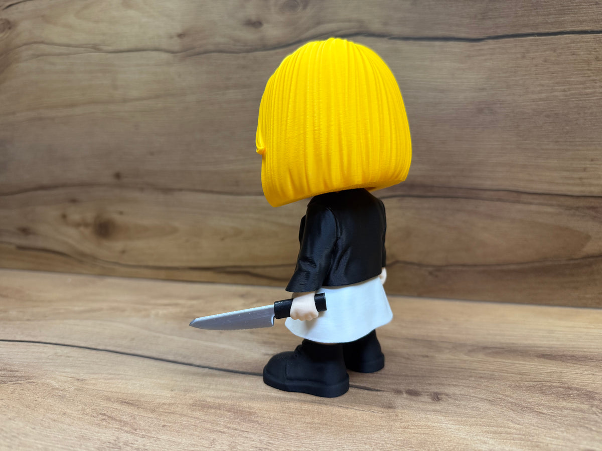 Tiffany Bride of Chucky Minifigure Sculpture — left side rear three-quarter view showing yellow bob hair texture strand detail, black leather jacket back panel, white dress and knife held behind at side