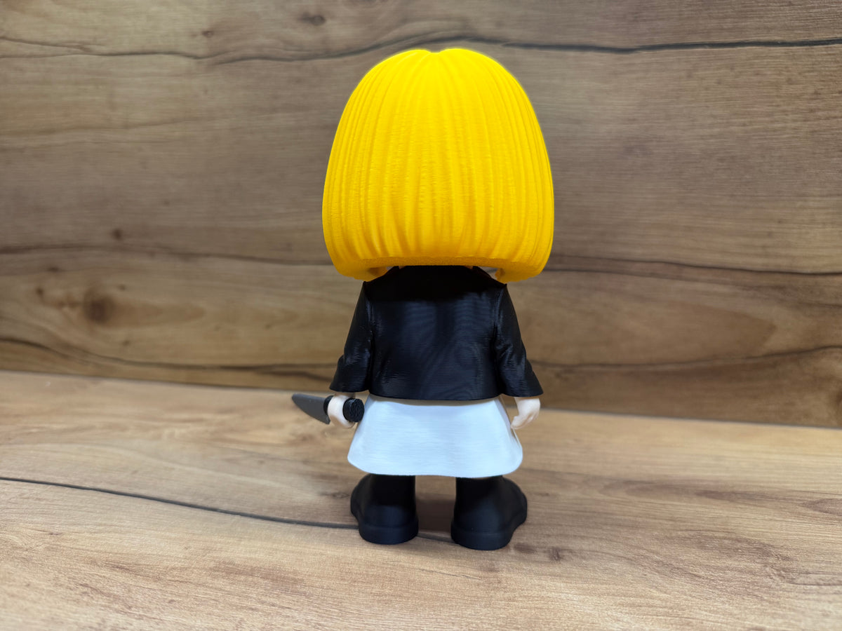 Tiffany Bride of Chucky Minifigure Sculpture — rear view showing full yellow bob hair mass with individual strand texture from centre parting, black leather jacket back, white dress rear and knife in right hand