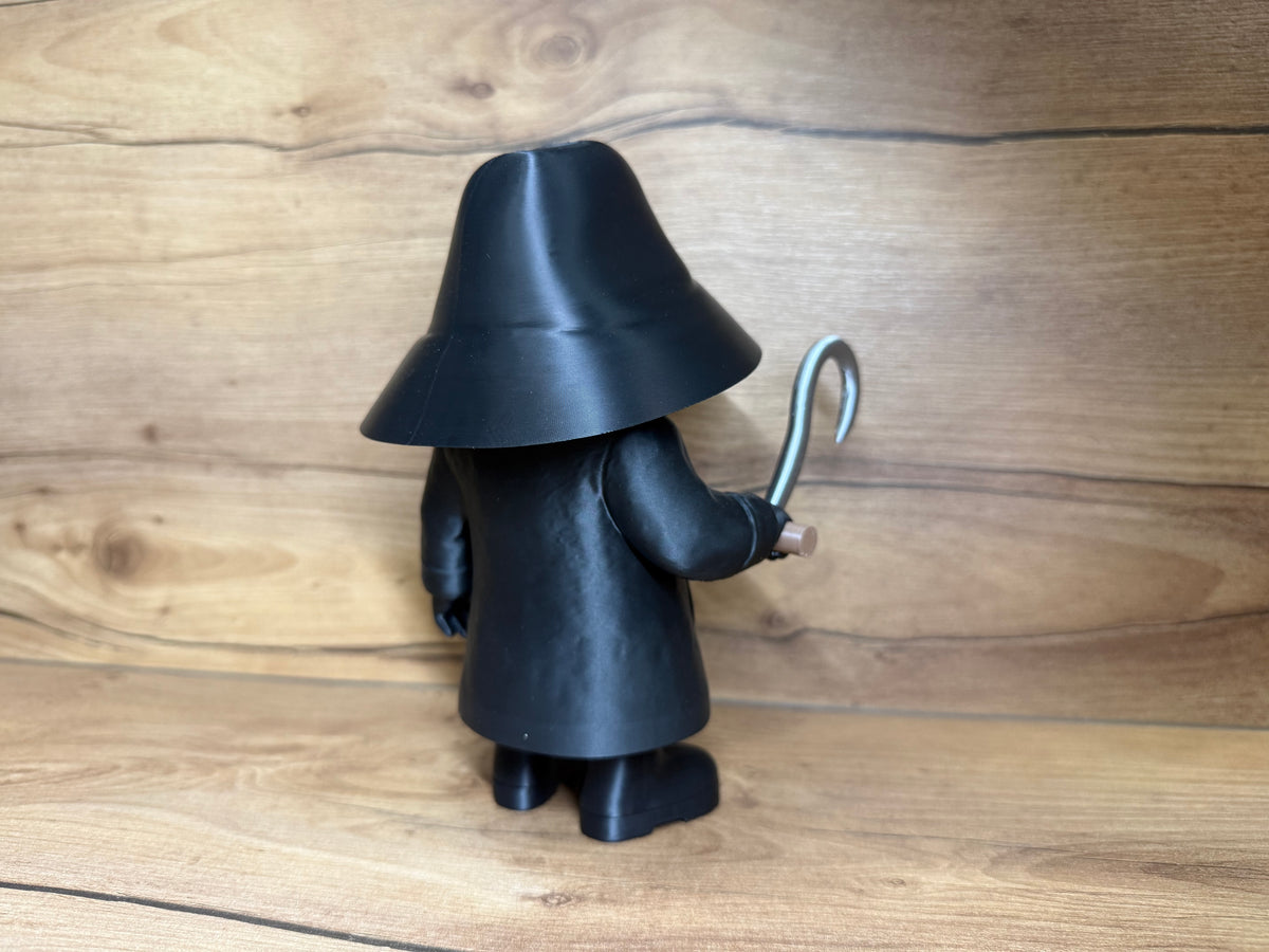 Candyman Horror Minifigure Sculpture — rear view showing full conical hat crown and wide brim rear sweep, black trench coat rear panel with horizontal texture lines, small black boots below coat hem and silver hook visible at right side