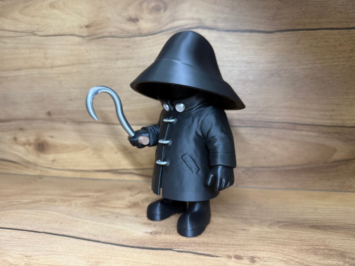 Candyman Horror Minifigure Sculpture — front three-quarter view showing full figure depth with wide brim hat shadow over face, silver goggle eyes in shadow, five silver toggle coat clasps, right hand holding silver hook raised to chest, compact chibi stance with black boots