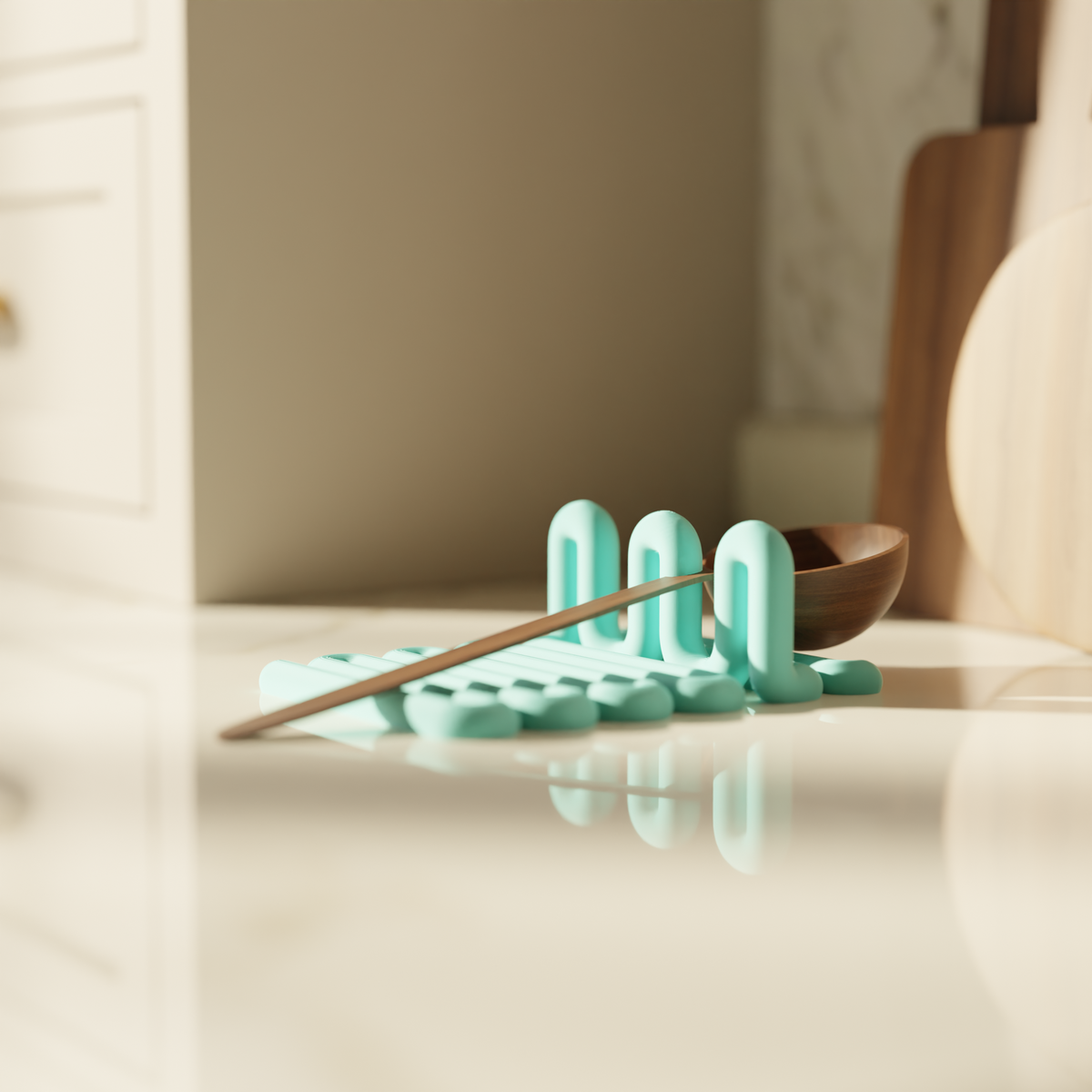Wibble Kitchen Utensil Holder Tray mint green wooden spoon on travertine stone with palm leaves editorial
