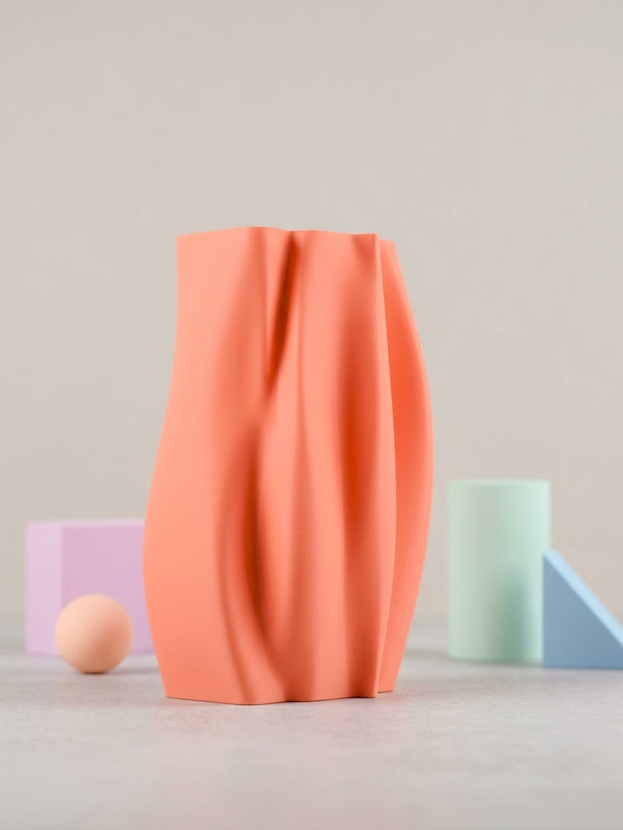 Elegant Organic Flow Vase orange on stacked rustic bricks Mediterranean olive tree warm sunlight