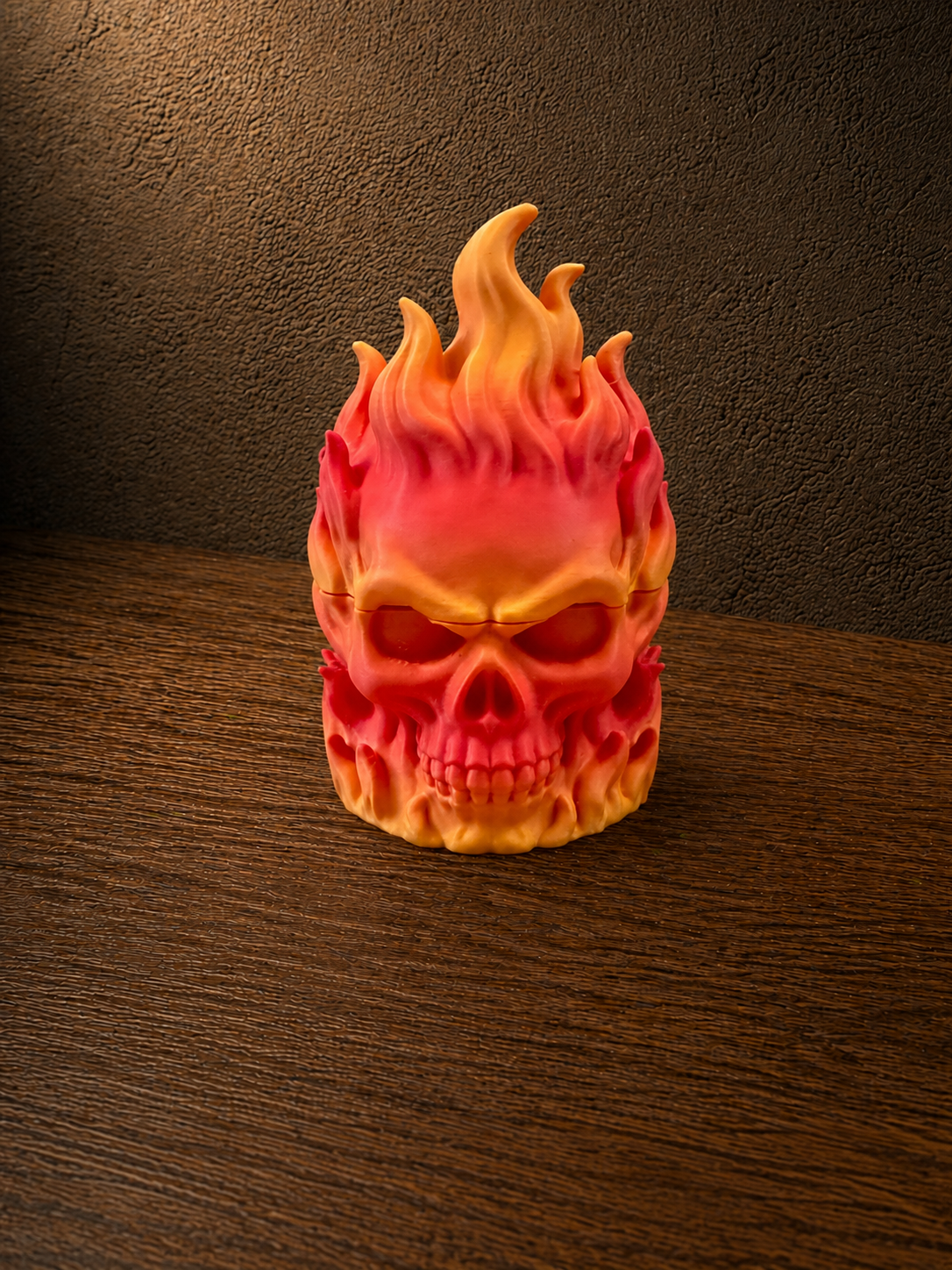Flaming Skull Herb Grinder separated into lid grinder and base