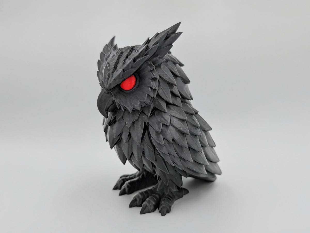 Crimson Watcher Owl angled view