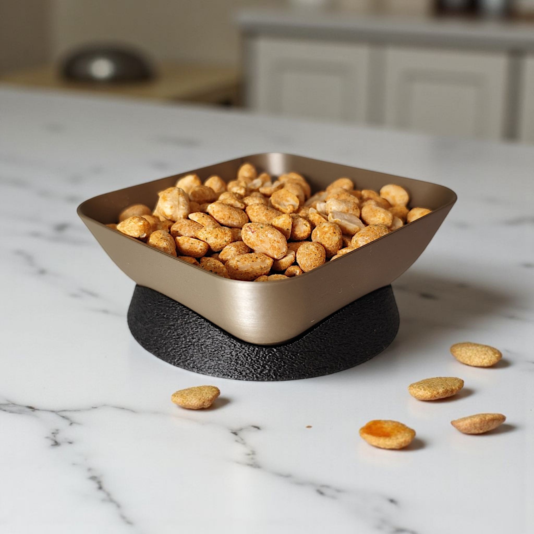 Tilted snack bowl with charm