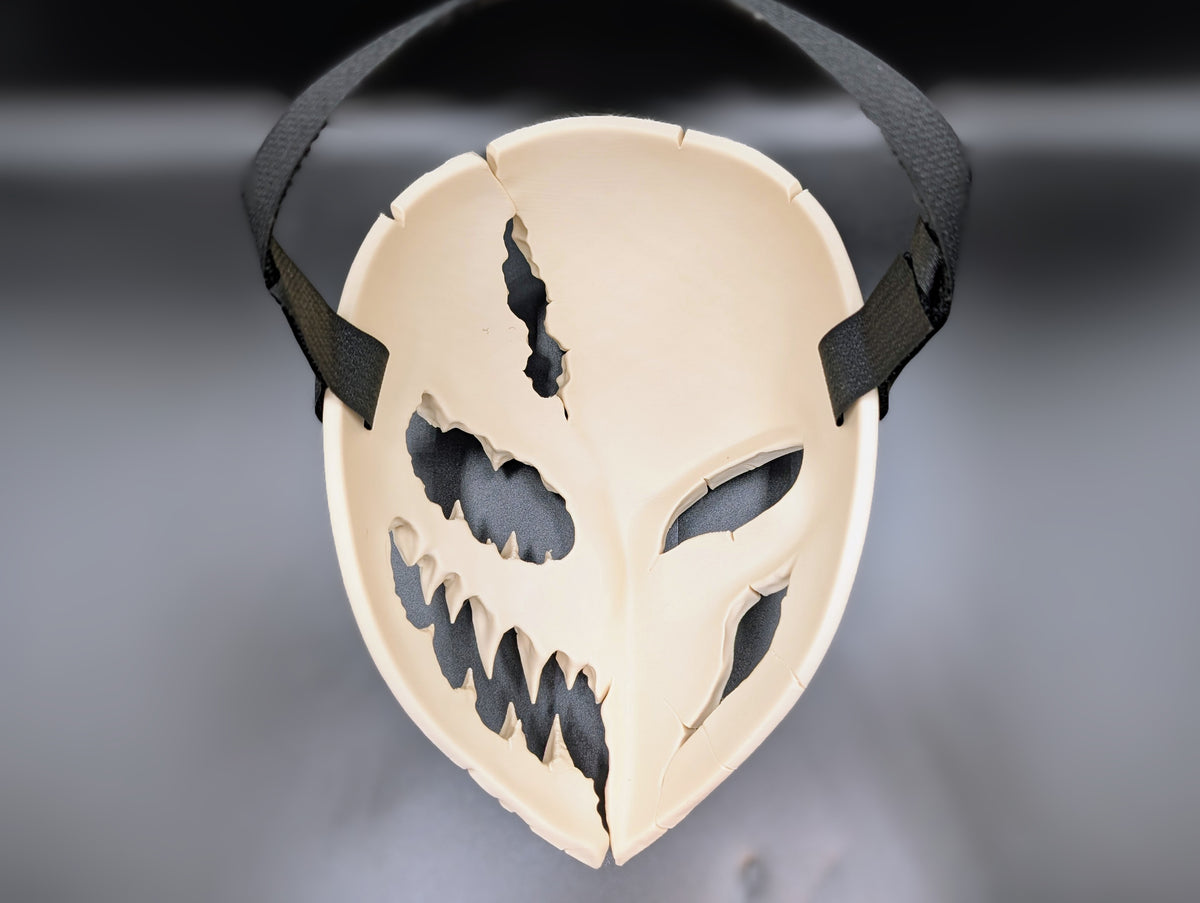 Rear view showing the mask and its side slots. The strap shown in the photo is not included.
