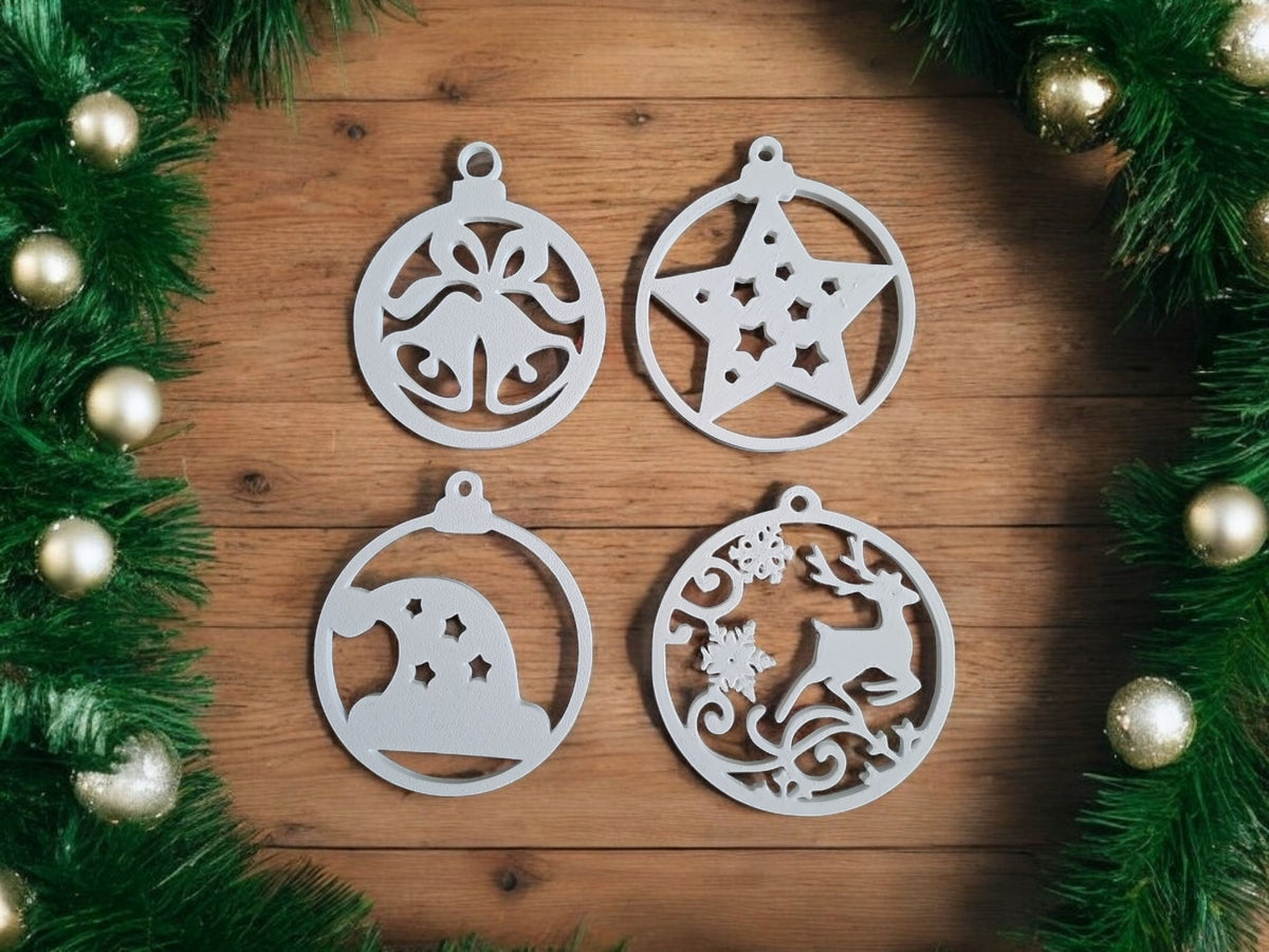 White plastic filigree Christmas ornament hanger set hanging on decorated Christmas tree warm golden fairy lights bokeh close up atmospheric cosy festive Christmas tree portrait