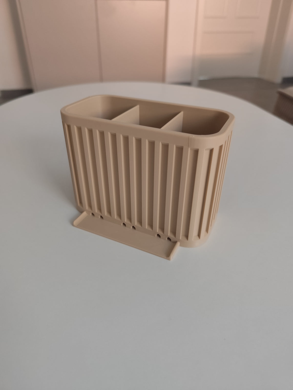 Japandi Cutlery Drainer beige three compartments holding silver cutlery on marble worktop lifestyle