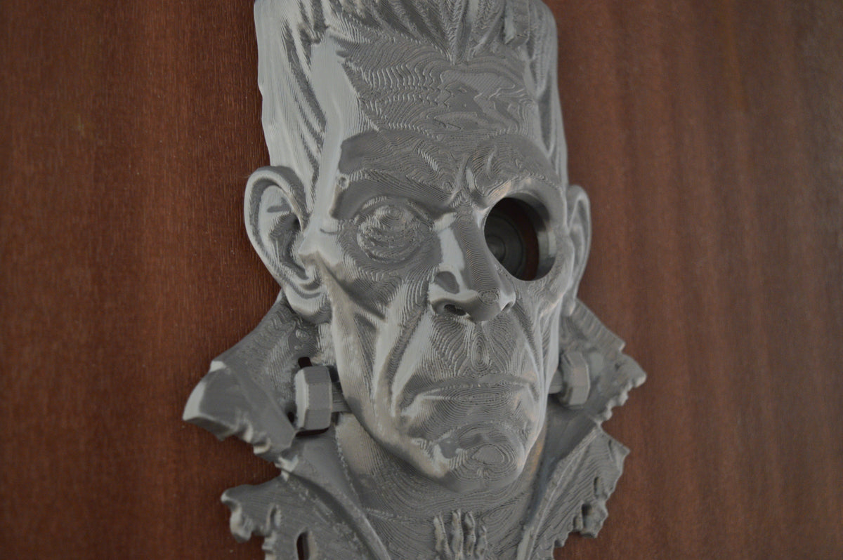Frankenstein peephole decoration front view on brown door