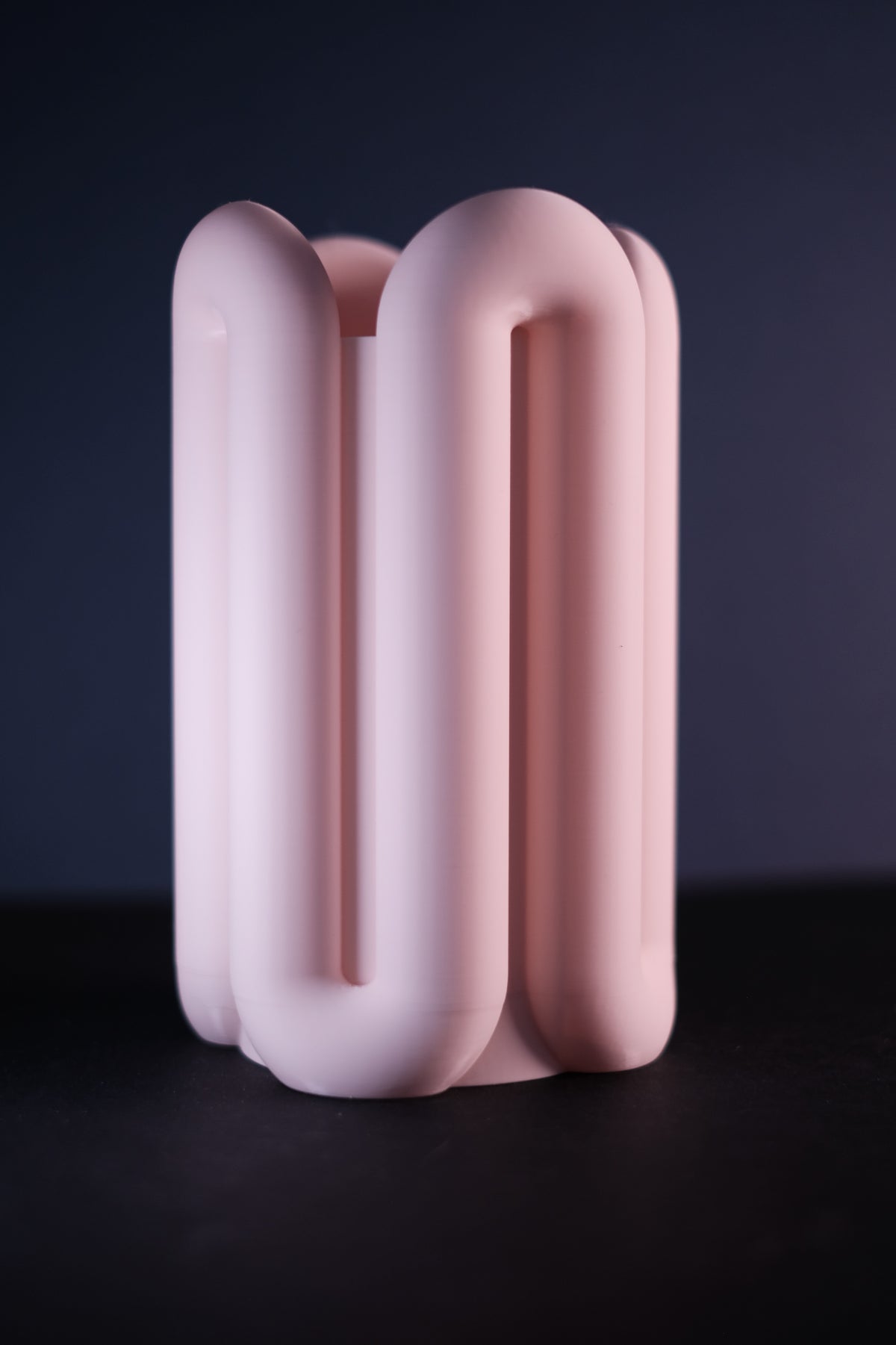 Eleva Wibble Aesthetic Vase blush pink on stacked travertine with eucalyptus and glass vase minimal lifestyle