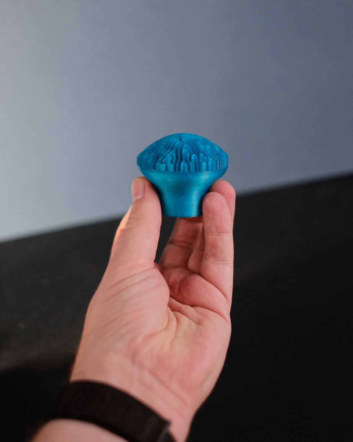 Reaction Diffusion Coral Cabinet Knob - blue held in hand side profile