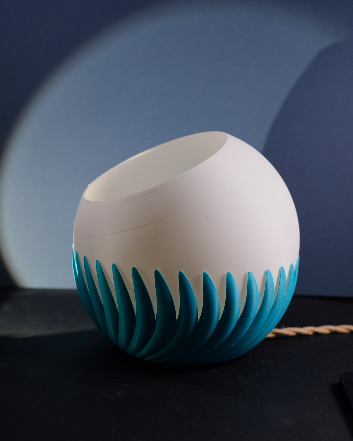 Modern Sphere E27 Lamp glowing on dark surface