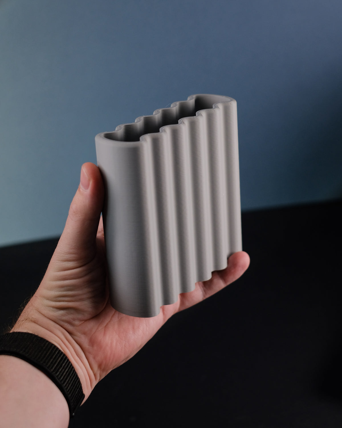 Terracotta orange ripple toothbrush holder product shot white background with toothbrush