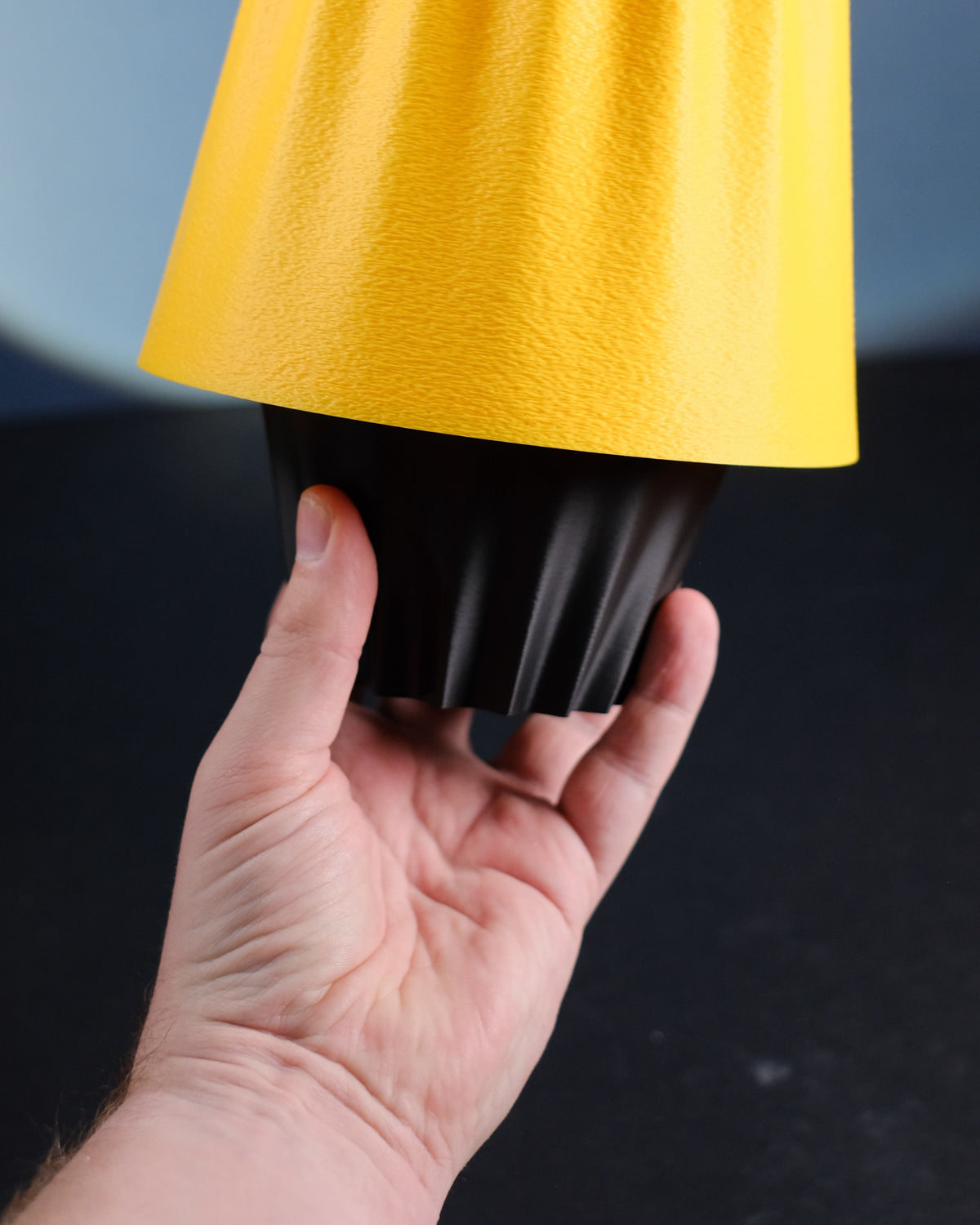 Fluted ambient desk lamp with yellow shade and black base