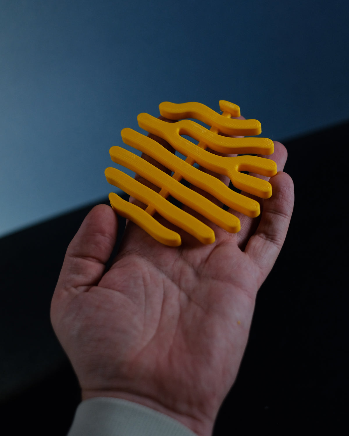 Orange coral coasters and pink inset stand separated