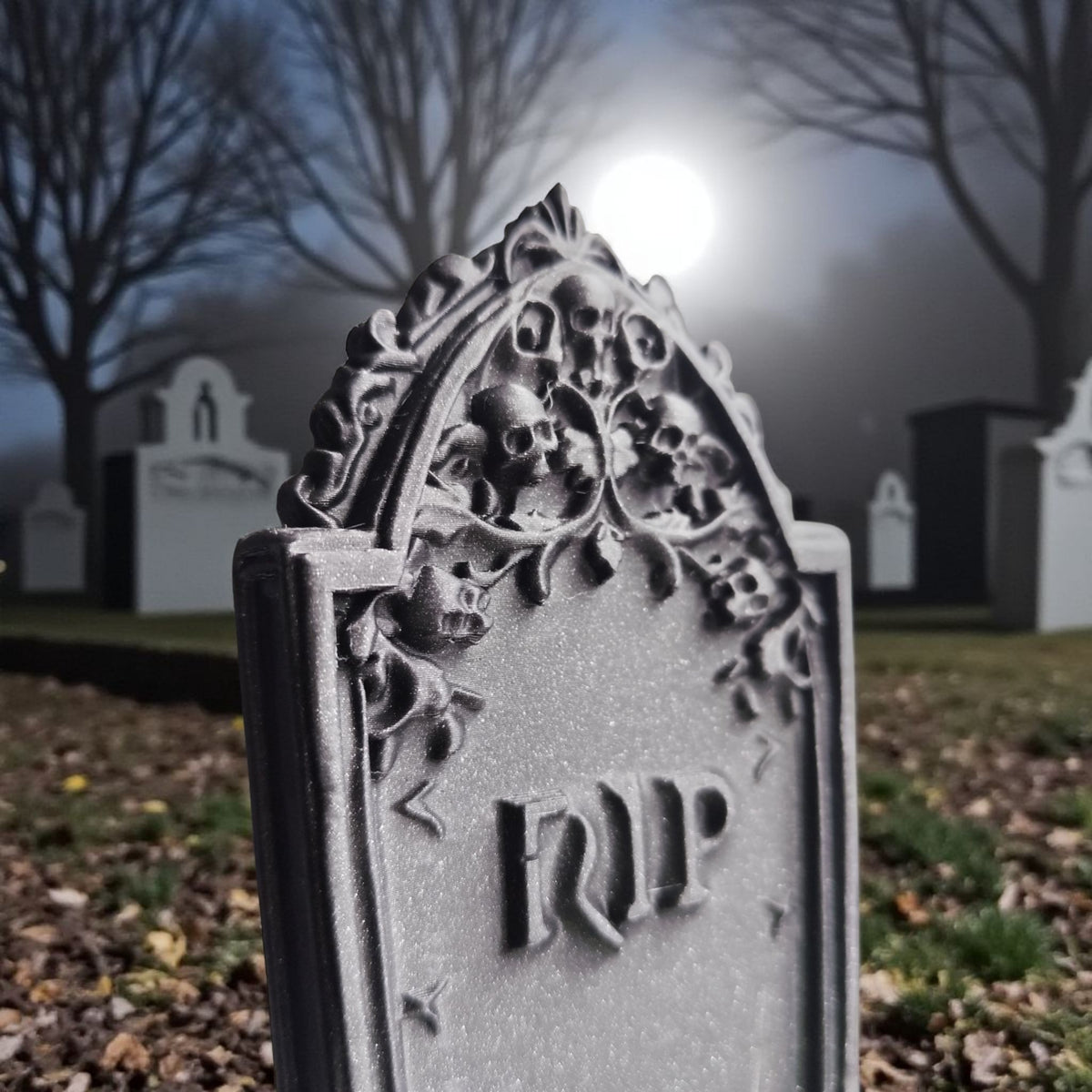 Matte grey gothic Halloween tombstone in foggy moonlit graveyard at night lifestyle