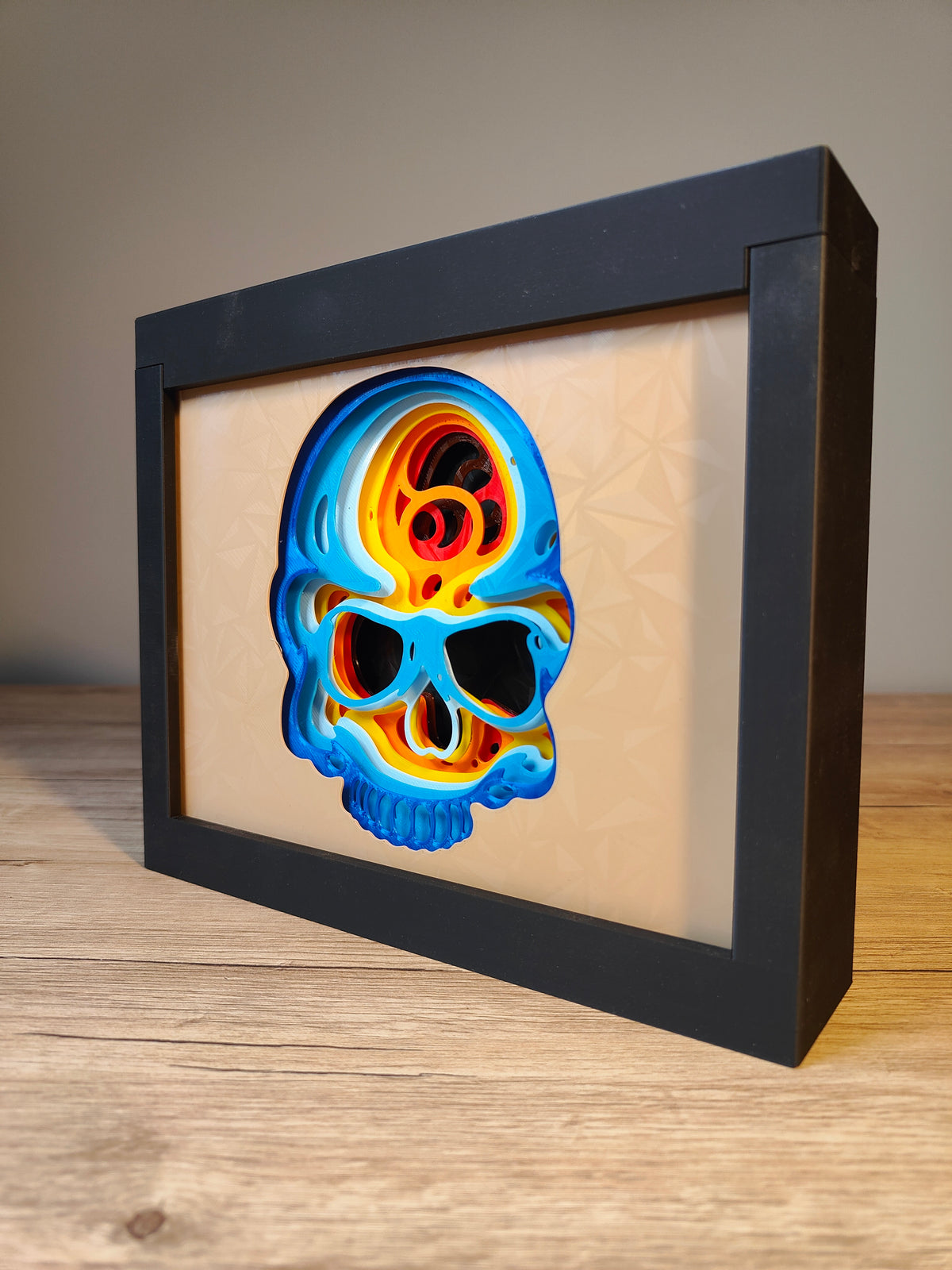 Skull shadow box - side angle showing depth of multi-layer design