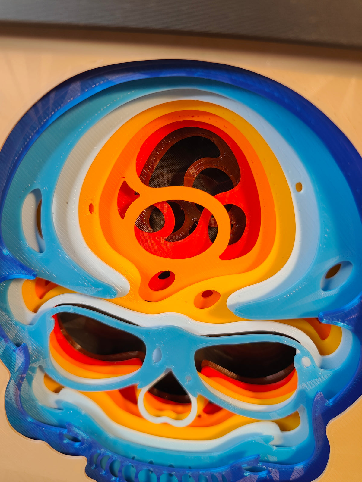 Skull shadow box - extreme close up of swirling patterns and layer detail