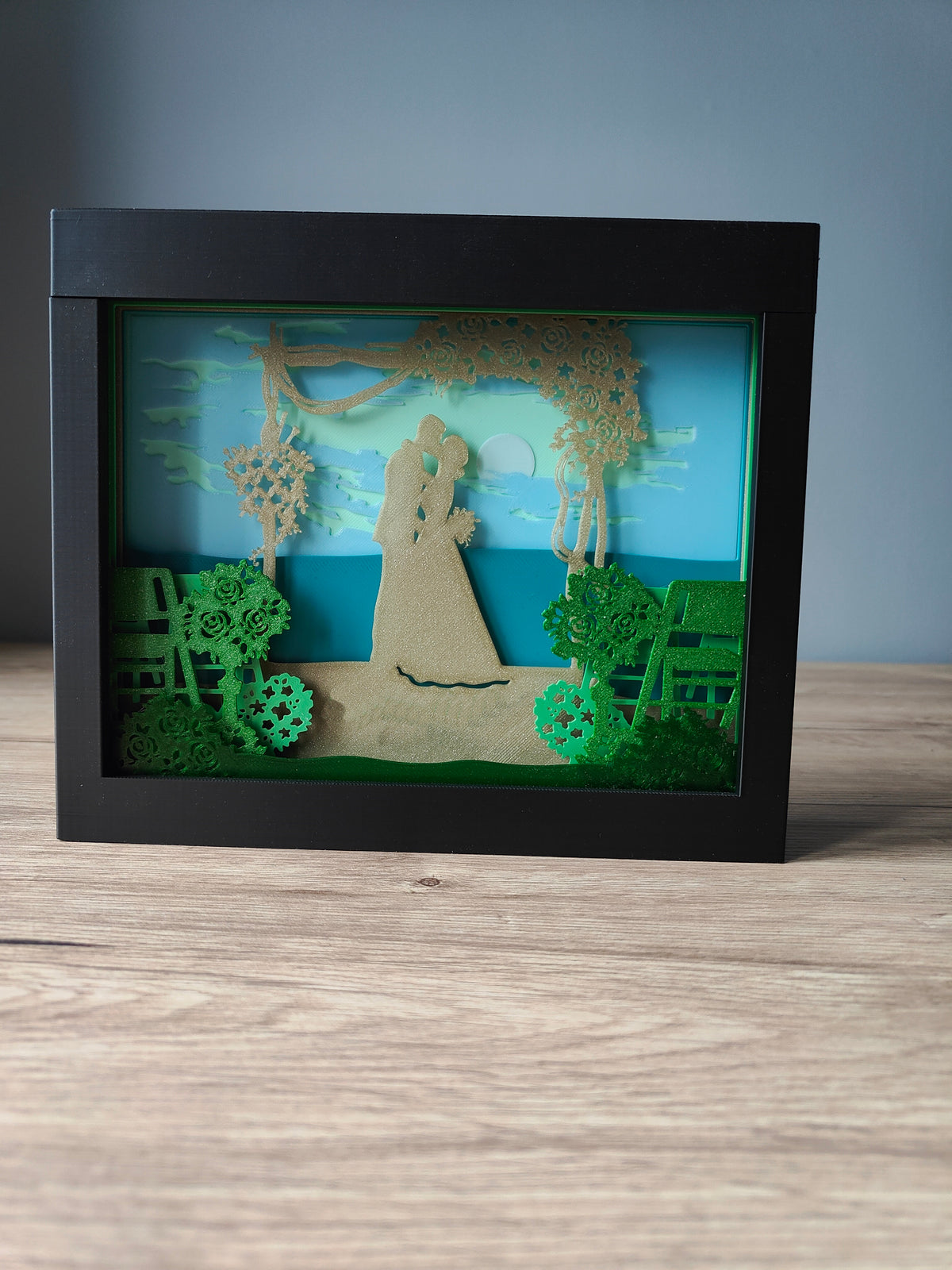Wedding shadow box - three quarter angle view on wooden surface
