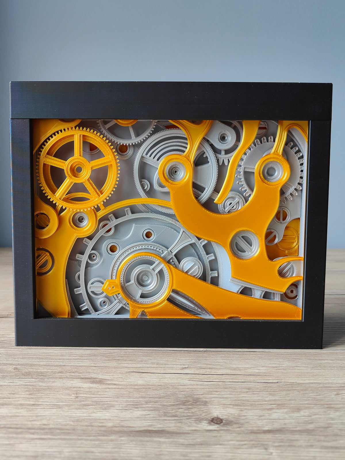Clockwork shadow box - full front view showing complete gold and silver gear composition