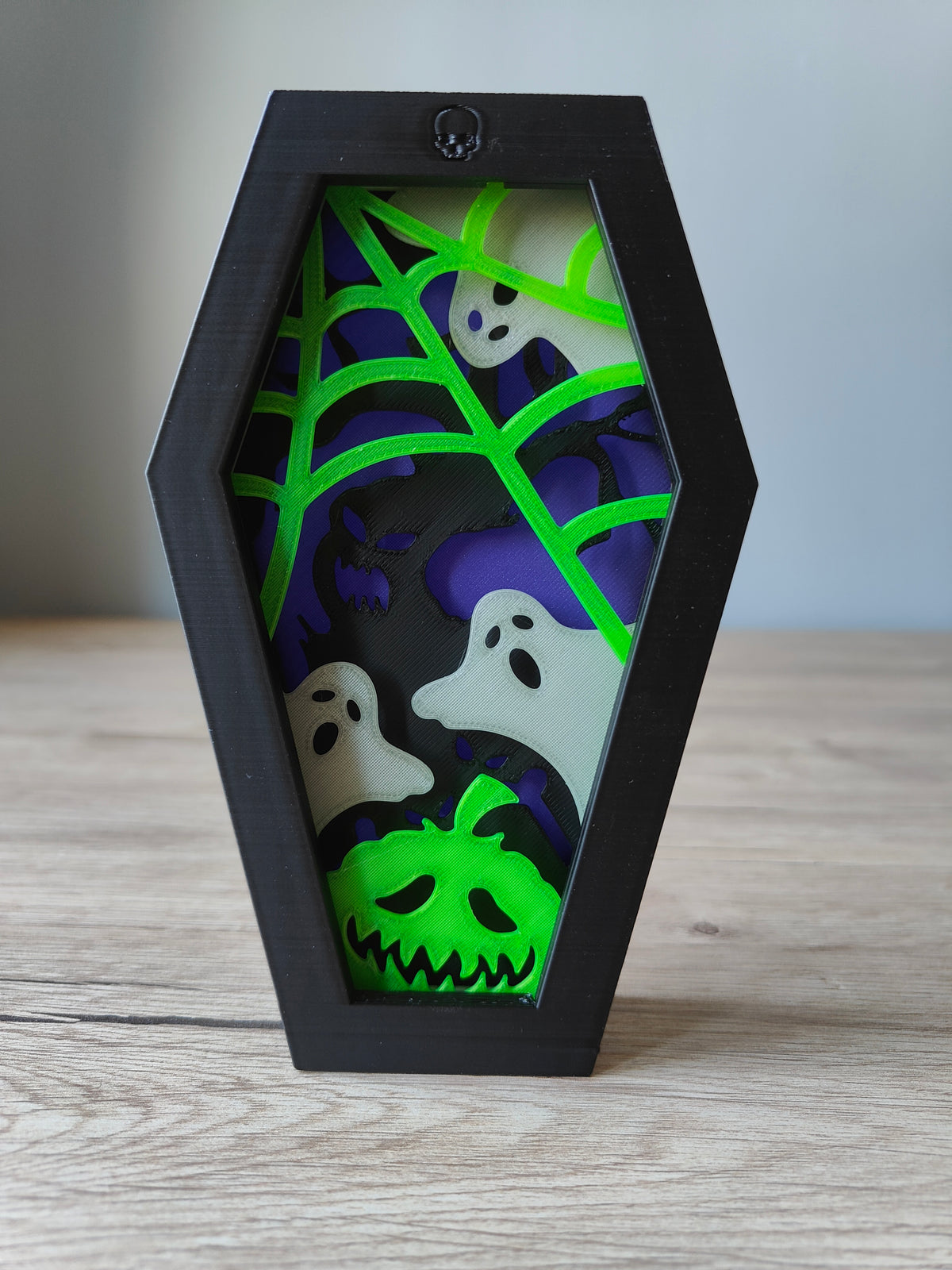 Halloween Coffin Shadow Box - Skeleton design front view with orange zombie hands