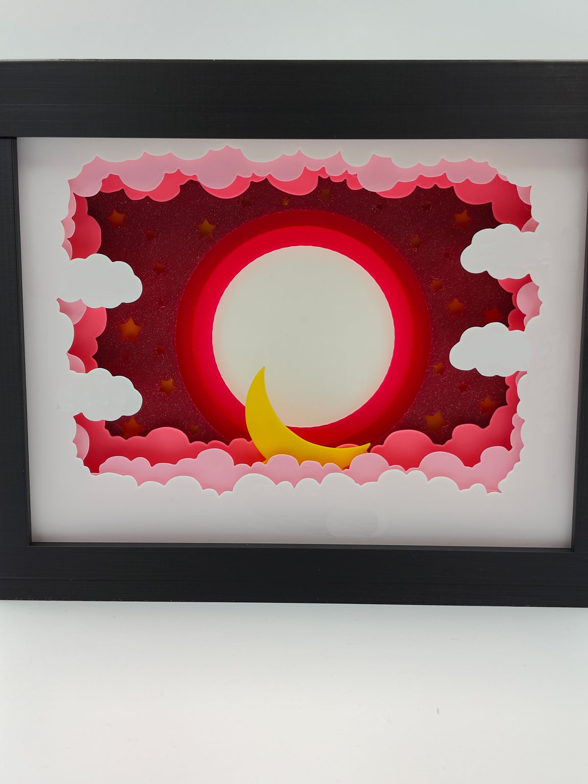 Baby Photo Frame Shadow Box - front view lit with warm red LED backlight showing birth details