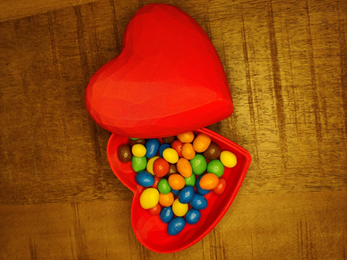 Heart-shaped gift box closed - orange, side angle