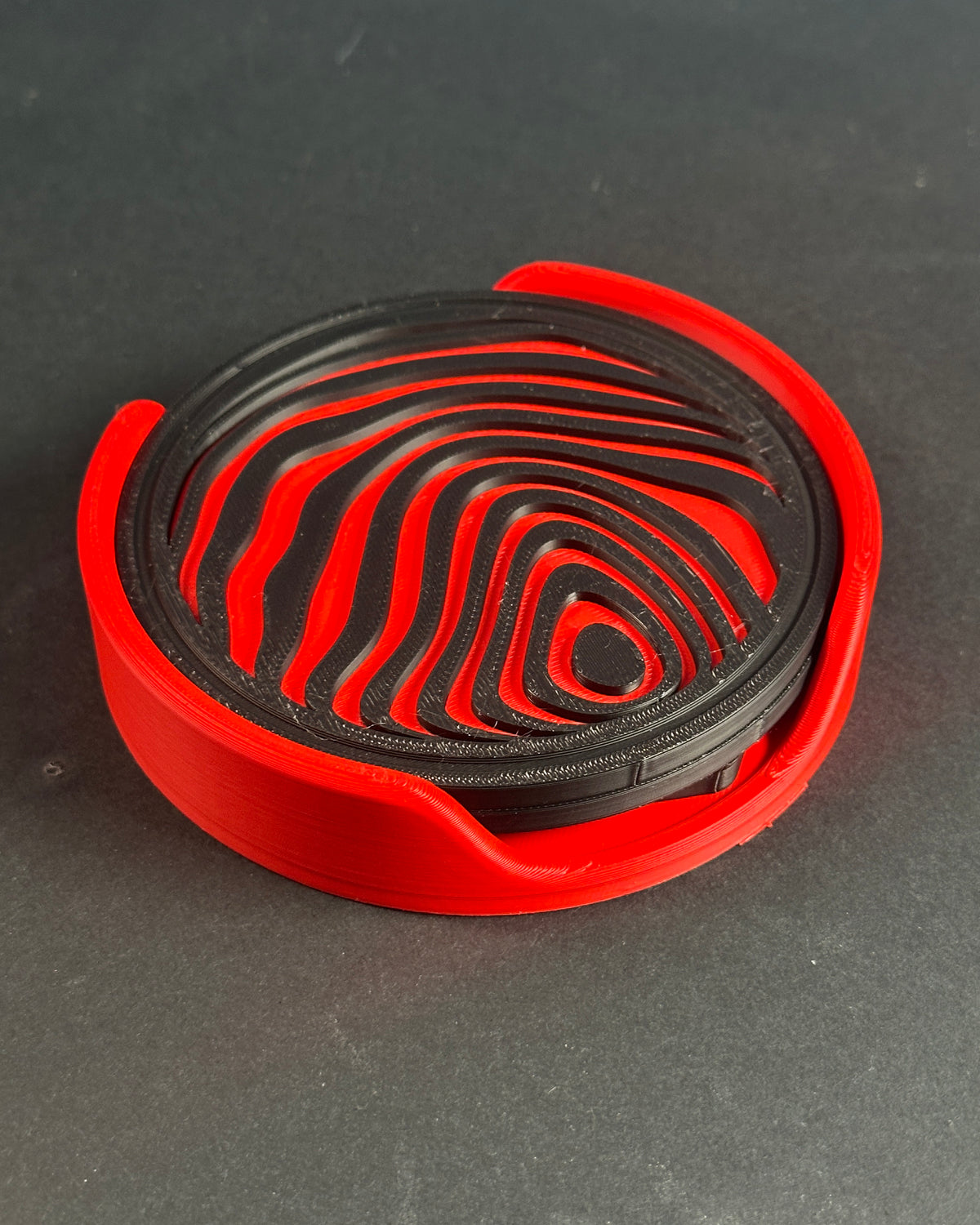 Red and black coaster set close-up