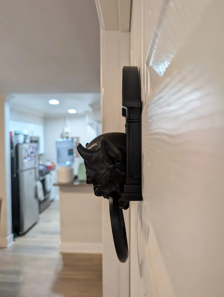 Gargoyle door knocker front view