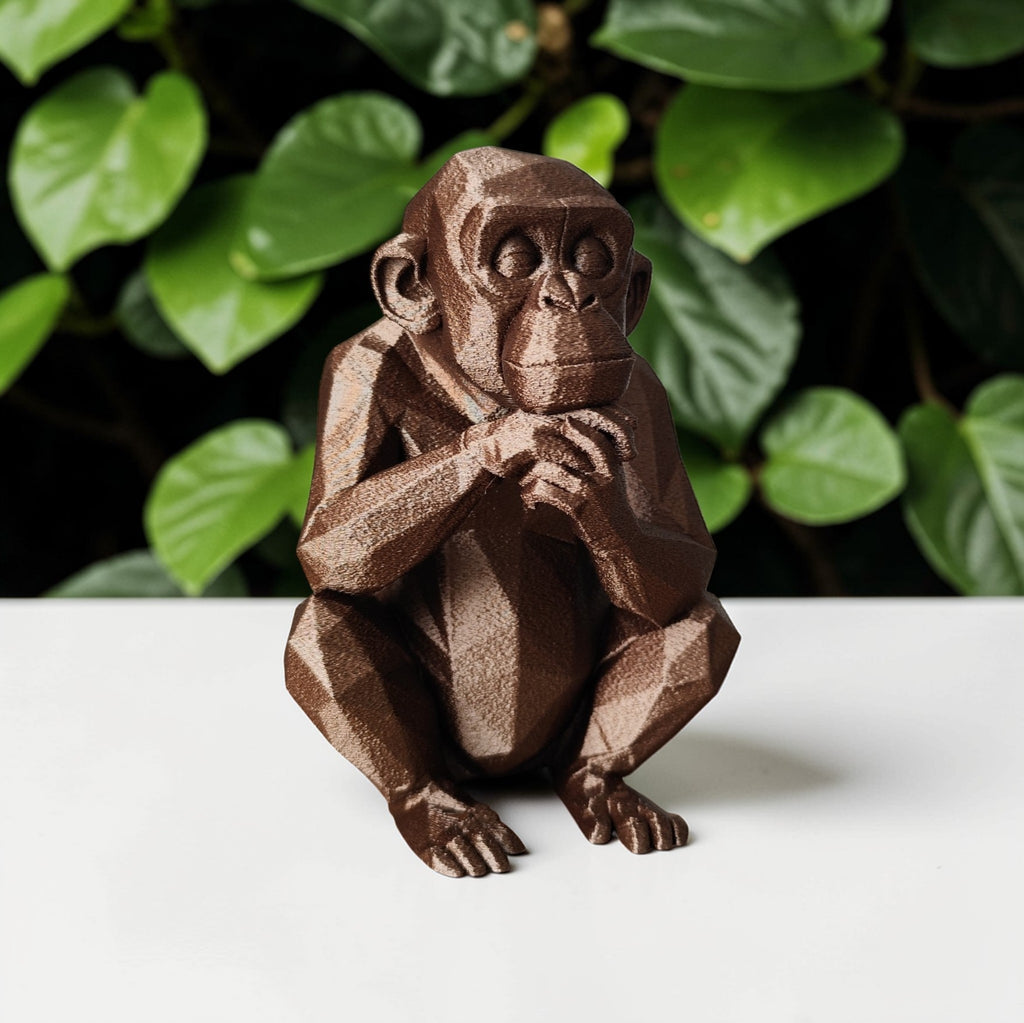 Thoughtful Low-Poly Chimpanzee Sculpture