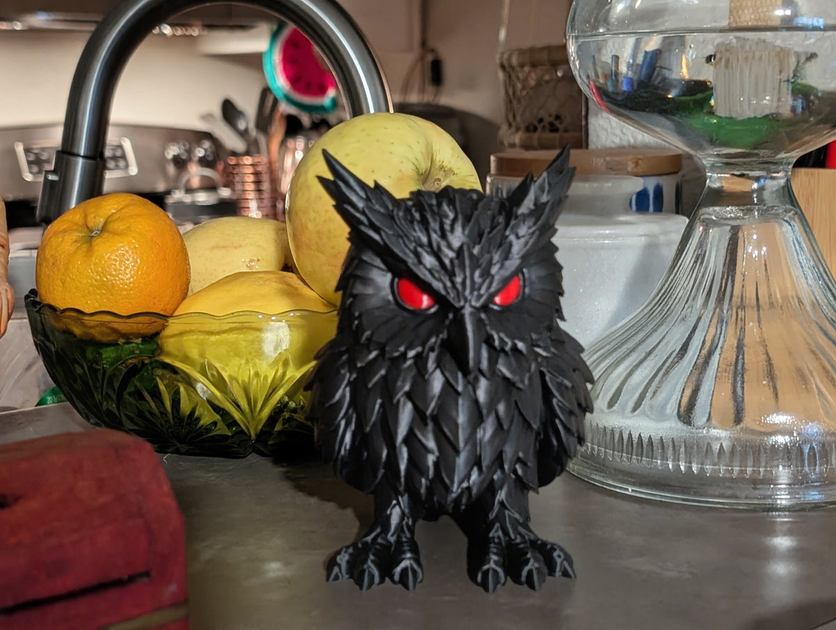 Crimson Watcher Owl on counter