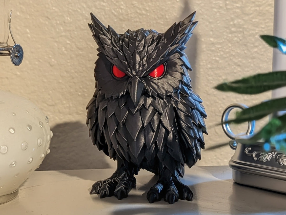 Crimson Watcher Owl on shelf