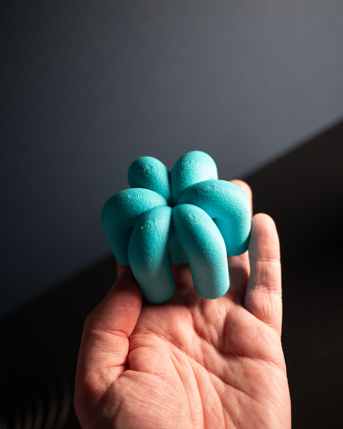 Wibble Cabinet Handle — mint green large close-up on white cabinet