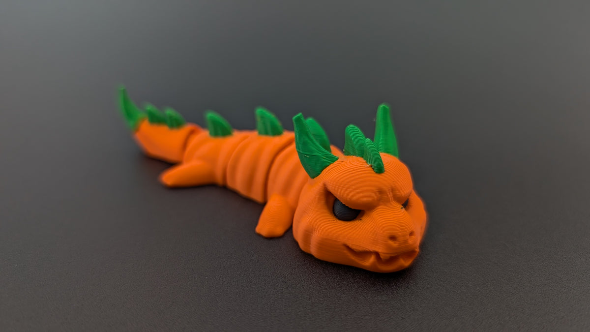 Pumpkin dragon posed with segmented body