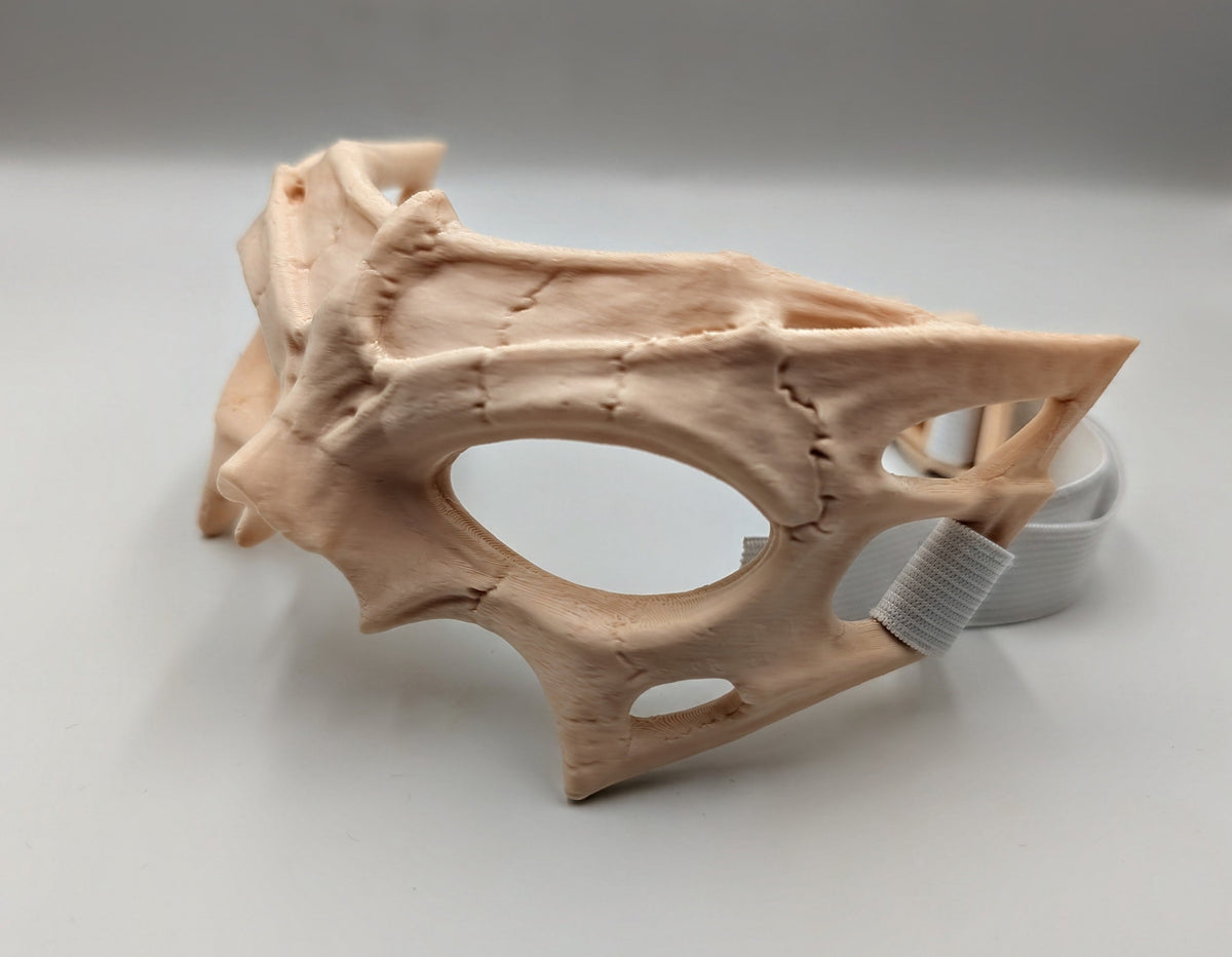 Side view showing the skeletal profile and open side cutouts.