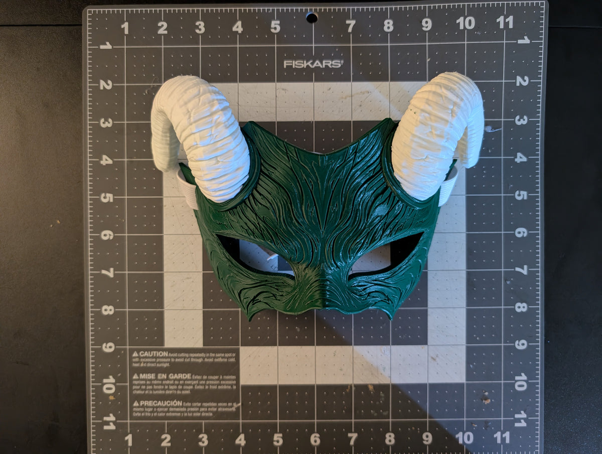 Close detail of the Faun Mask's flowing organic surface; strap not included