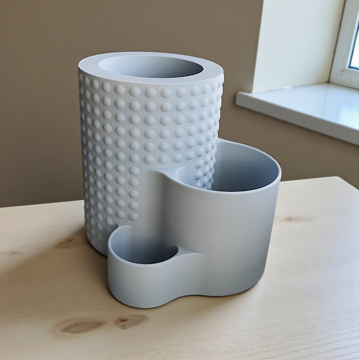 Modern Dotted Office Organiser — grey on office desk with monitor and plants