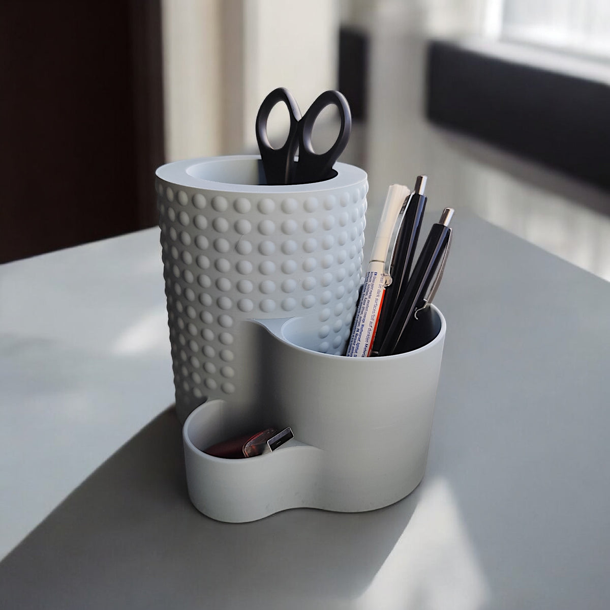 Modern Dotted Office Organiser — grey on white desk with books and lamp
