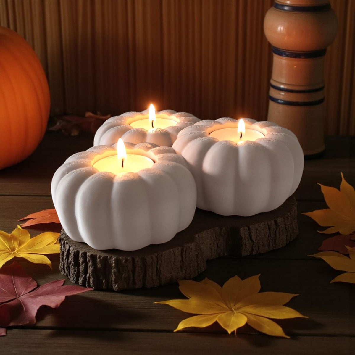 Three white pumpkin tealight holders product shot 10