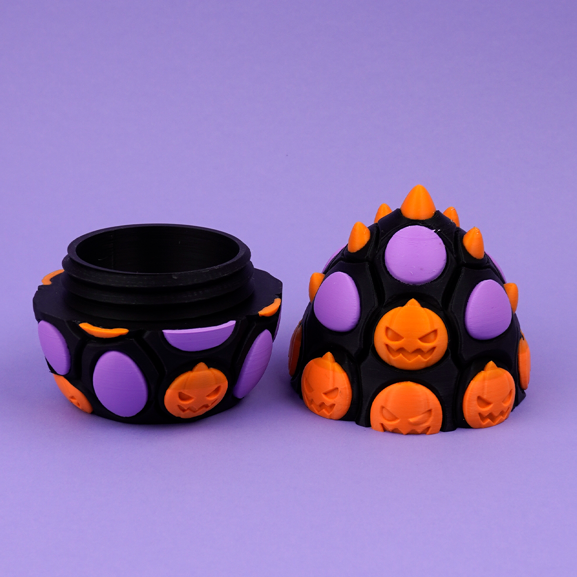 Halloween Dragon Egg front view showing orange pumpkins and lilac scales