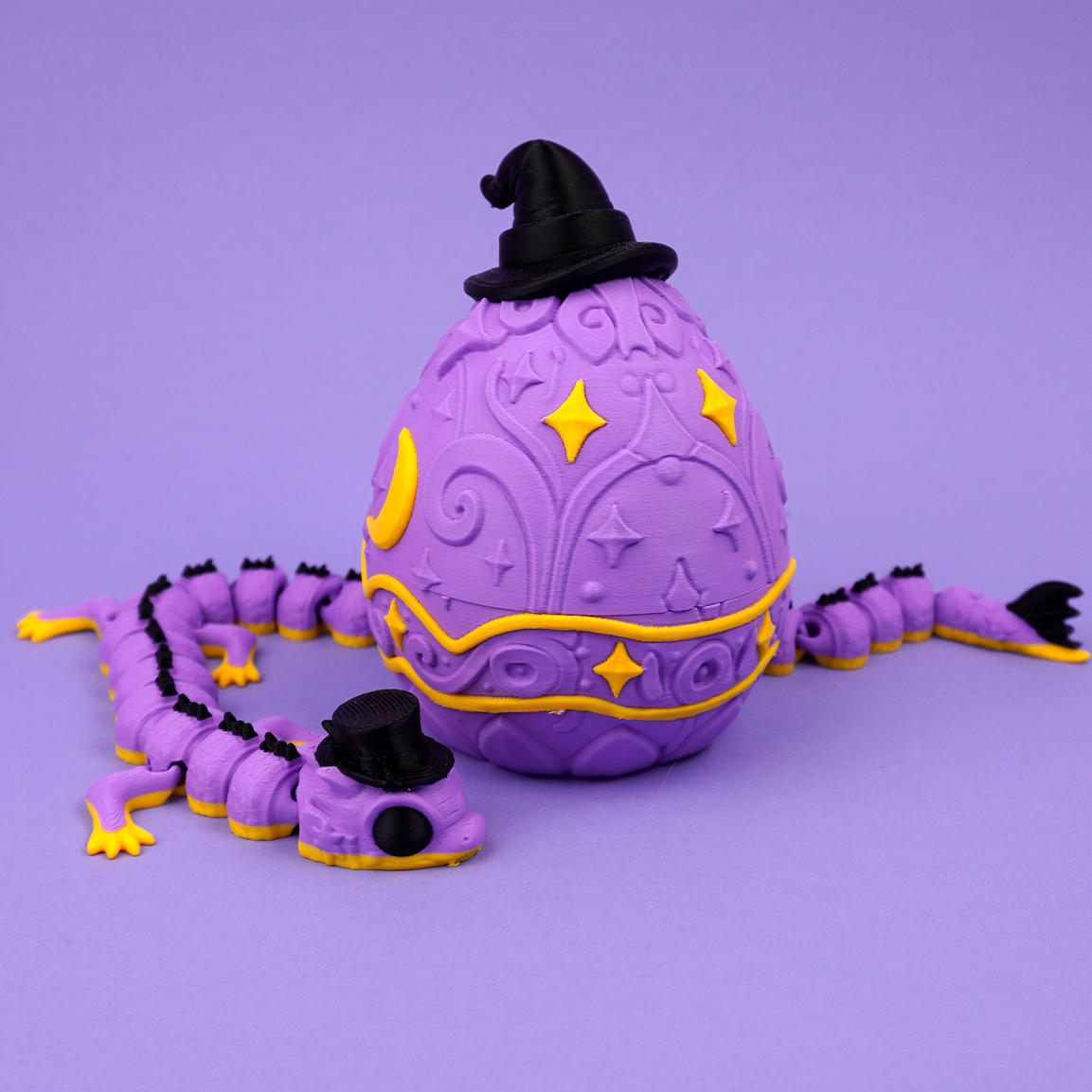 Wizard Dragon Egg box beside dragon figure; dragon figure not included