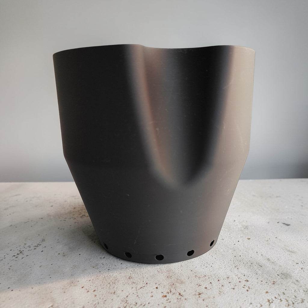 Self-watering plant pot in a hammered design